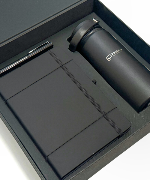 Tumbler with handle, sign pen and notebook in a rigid box.