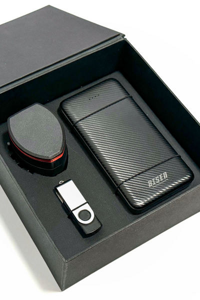 Universal travel adaptor, flash drive and `Bisen power bank in a rigid box.