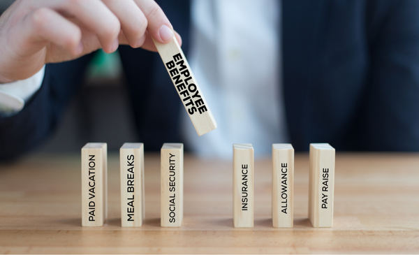 a-handing-holding-up-a-wooden-block-with-words-employee-benefits