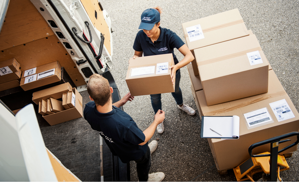 a-woman-delivering-packages-to-a-man