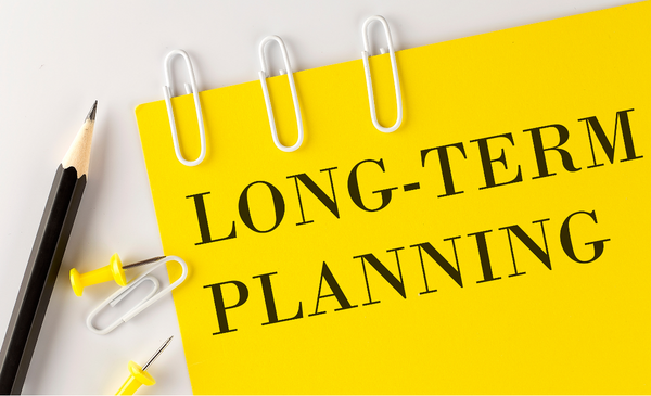 yellow-paper-with-words-written-long-term-planning