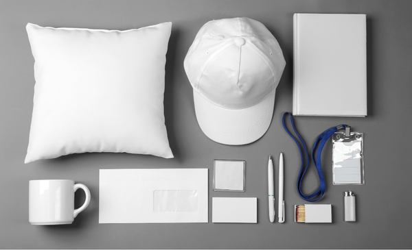 White-pillow-with-white-cap-white-notebook-white-mug-white-envelope-white-card-case-white-pens-white-match-box-white-id-lace-and-white-lighter