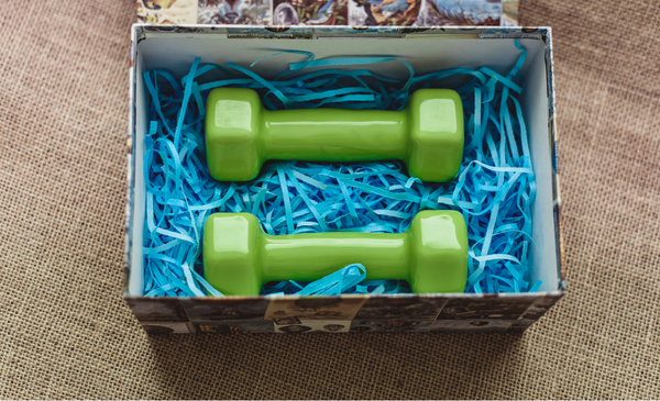 a-pair-of-dumbells-inside-a-gift-box